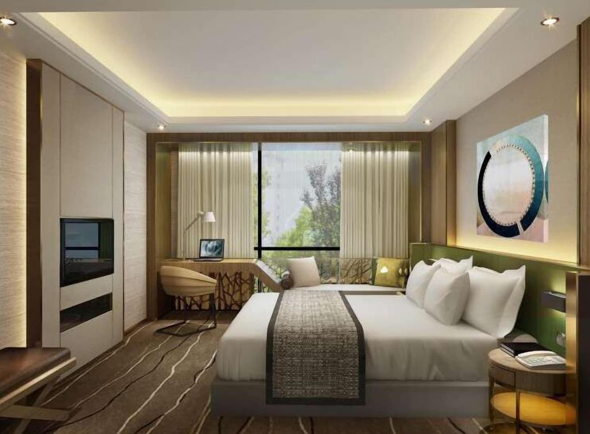 Leshan Ramada Hotel Esterno foto