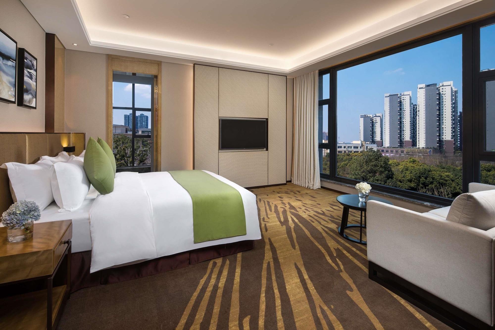 Leshan Ramada Hotel Esterno foto