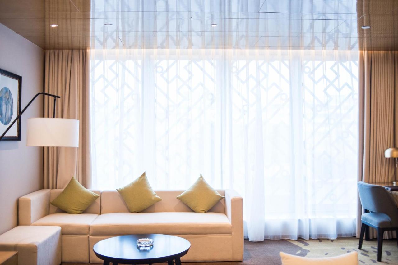 Leshan Ramada Hotel Esterno foto