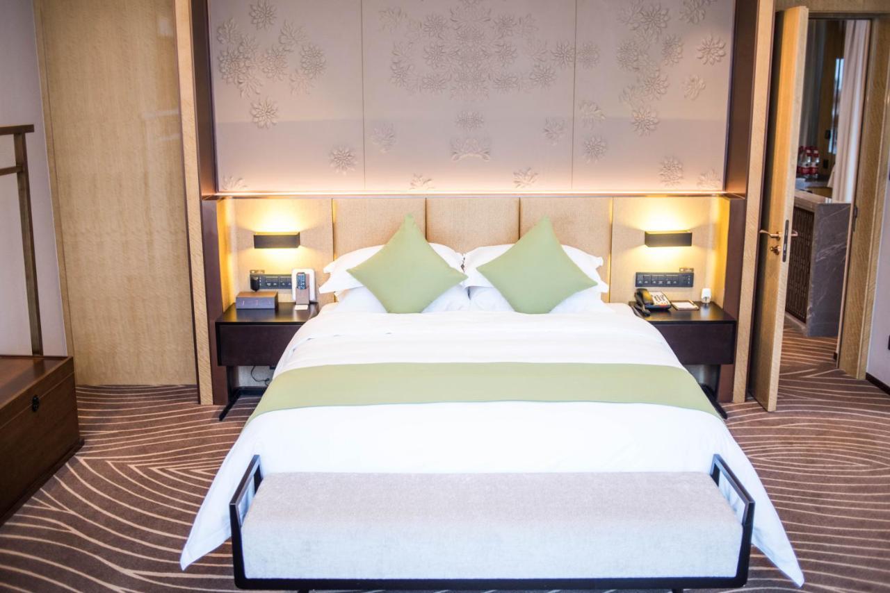 Leshan Ramada Hotel Esterno foto
