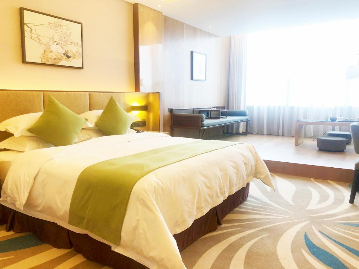 Leshan Ramada Hotel Esterno foto