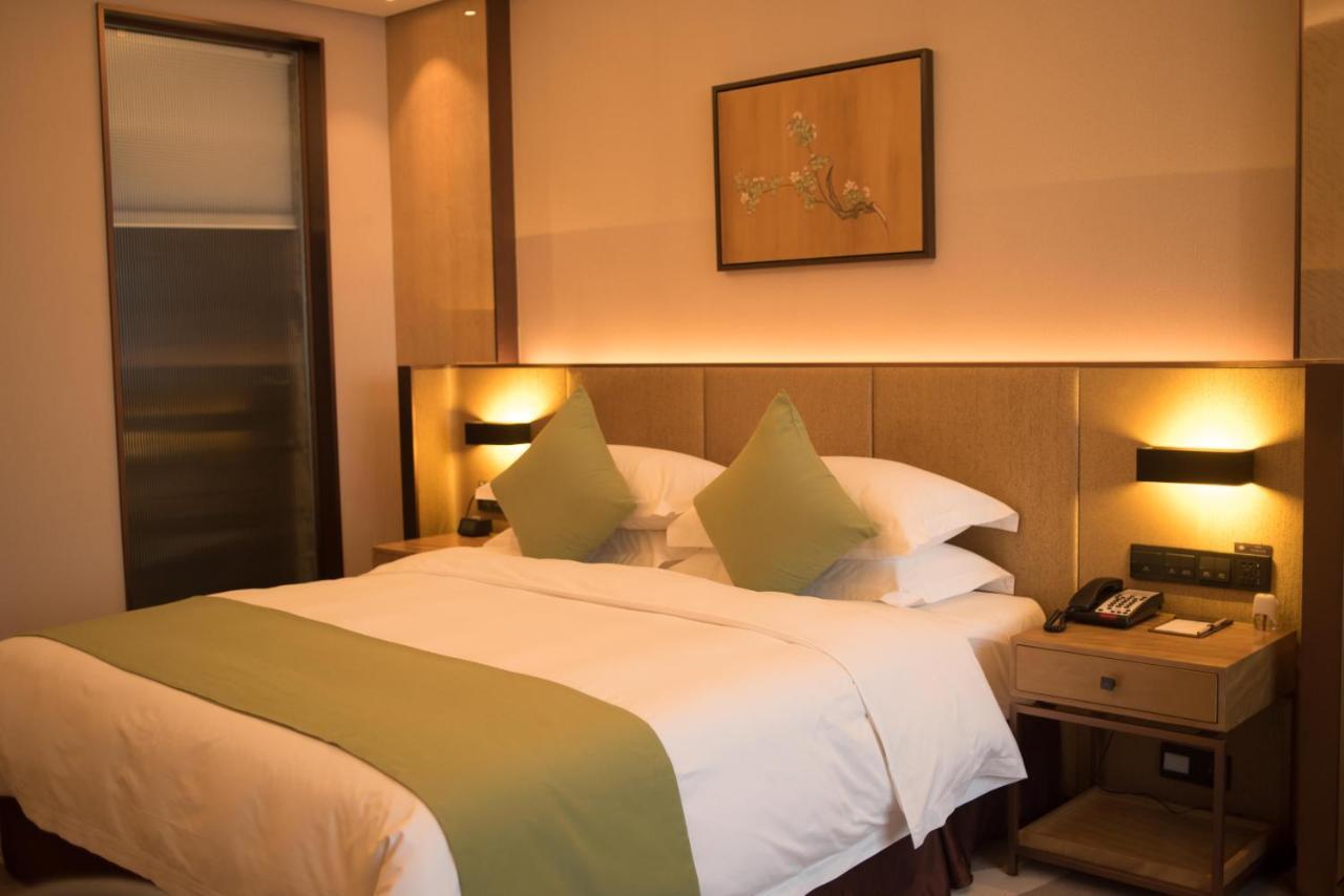 Leshan Ramada Hotel Esterno foto