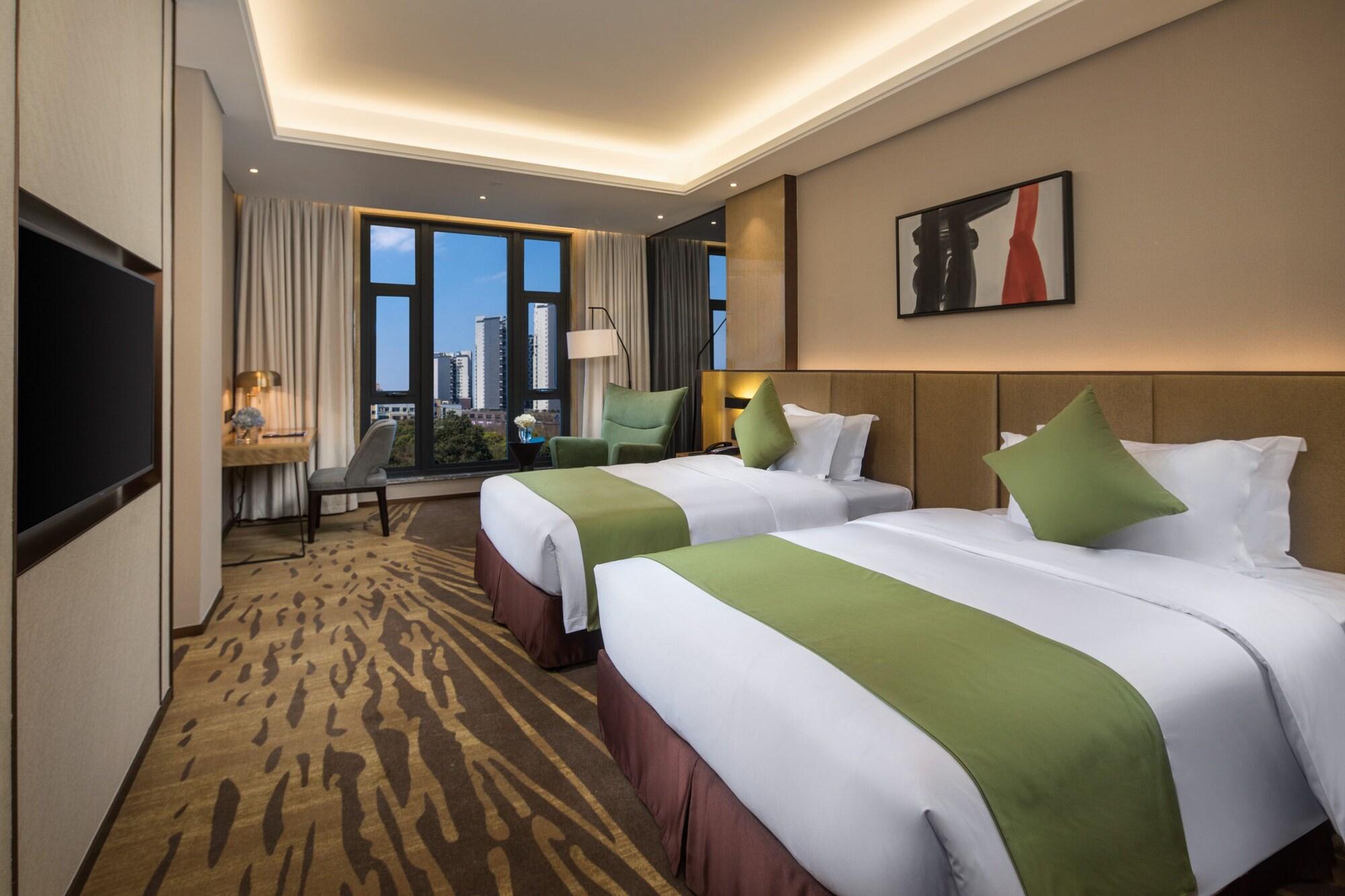 Leshan Ramada Hotel Esterno foto