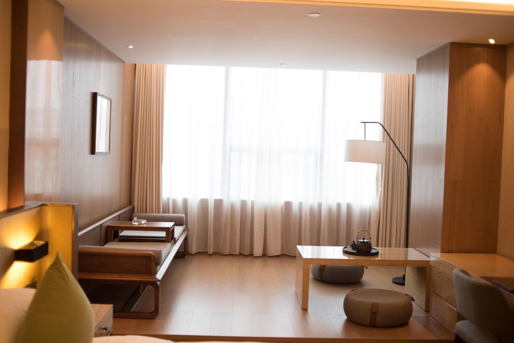 Leshan Ramada Hotel Esterno foto