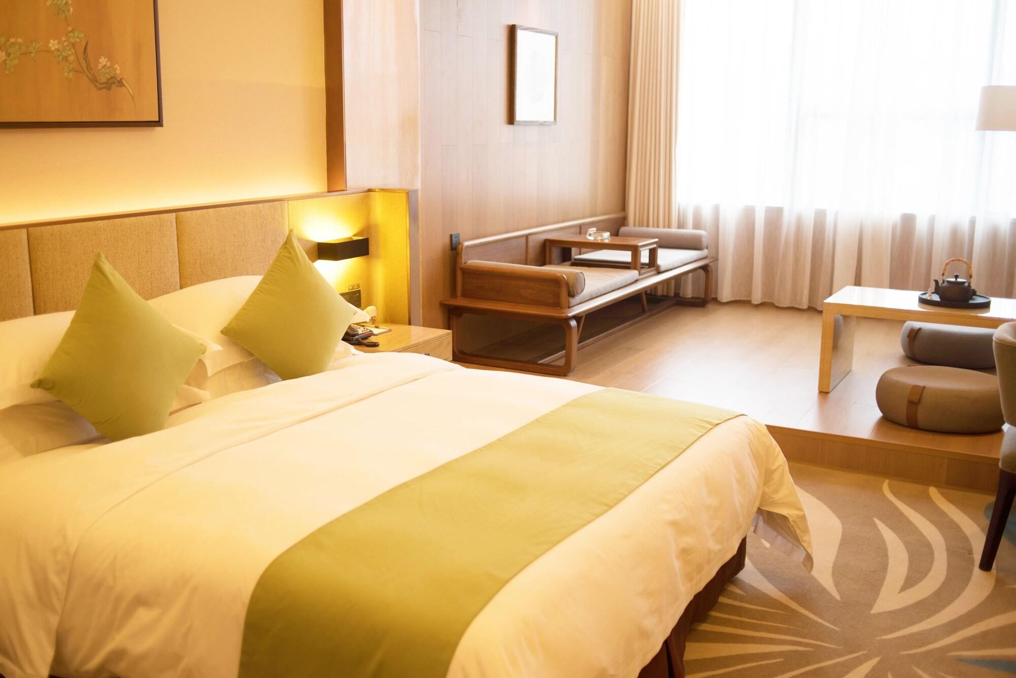 Leshan Ramada Hotel Esterno foto