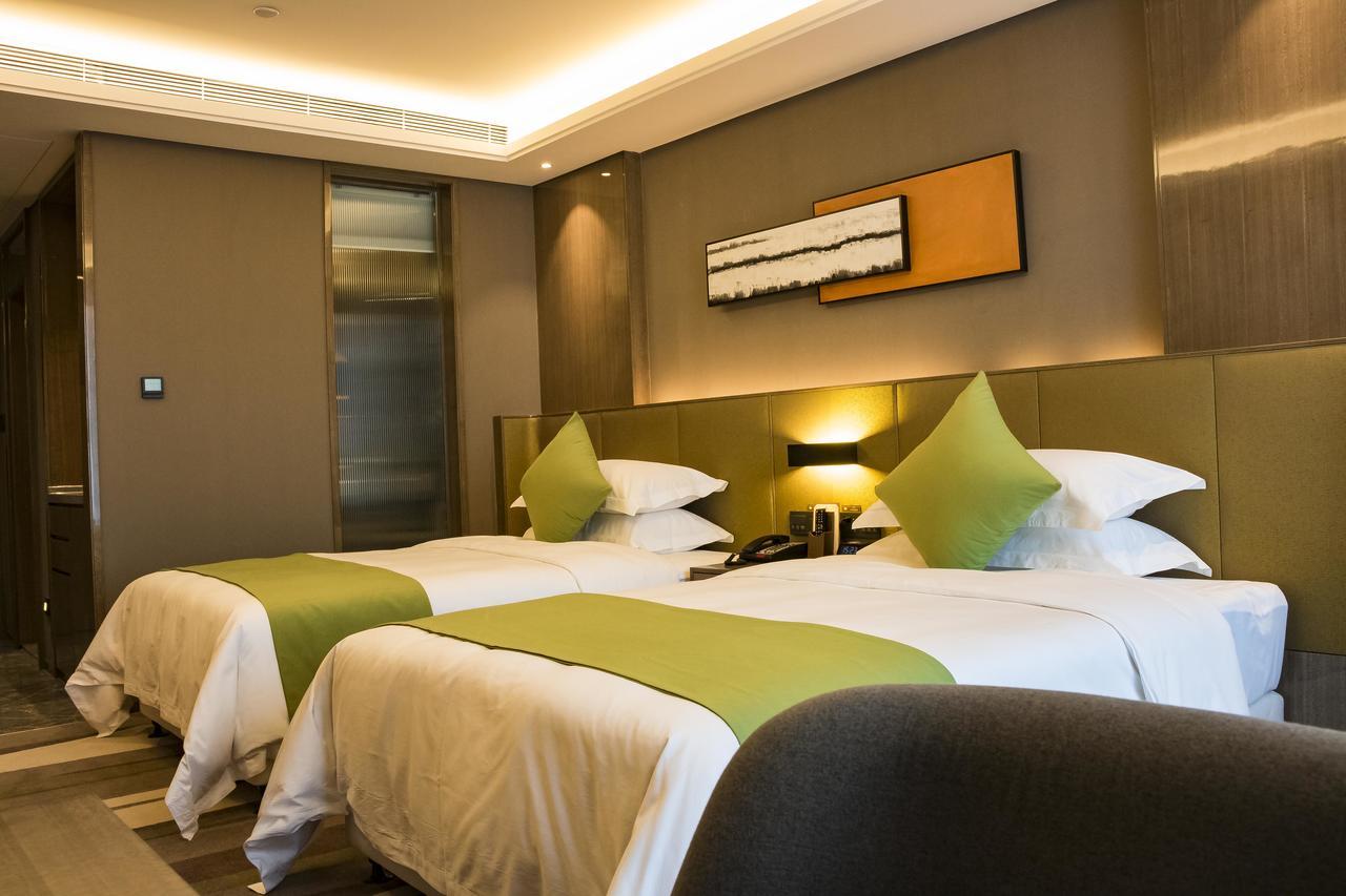 Leshan Ramada Hotel Esterno foto