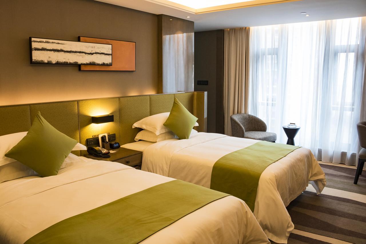 Leshan Ramada Hotel Esterno foto