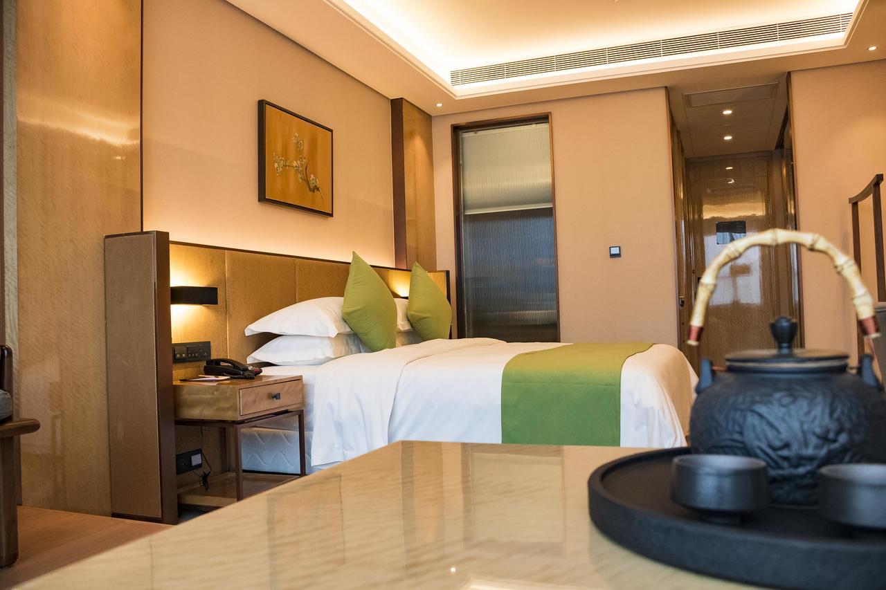 Leshan Ramada Hotel Esterno foto