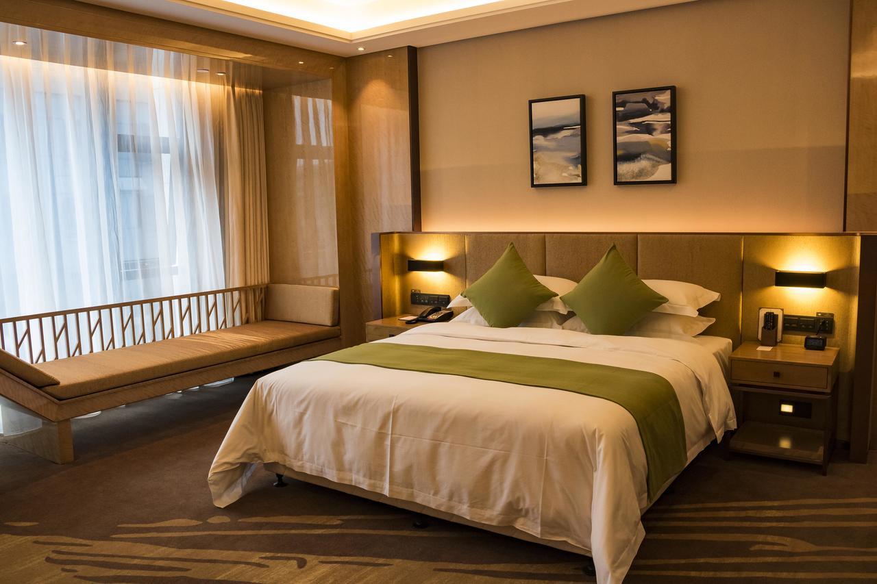 Leshan Ramada Hotel Esterno foto