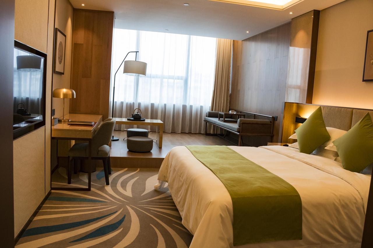 Leshan Ramada Hotel Esterno foto