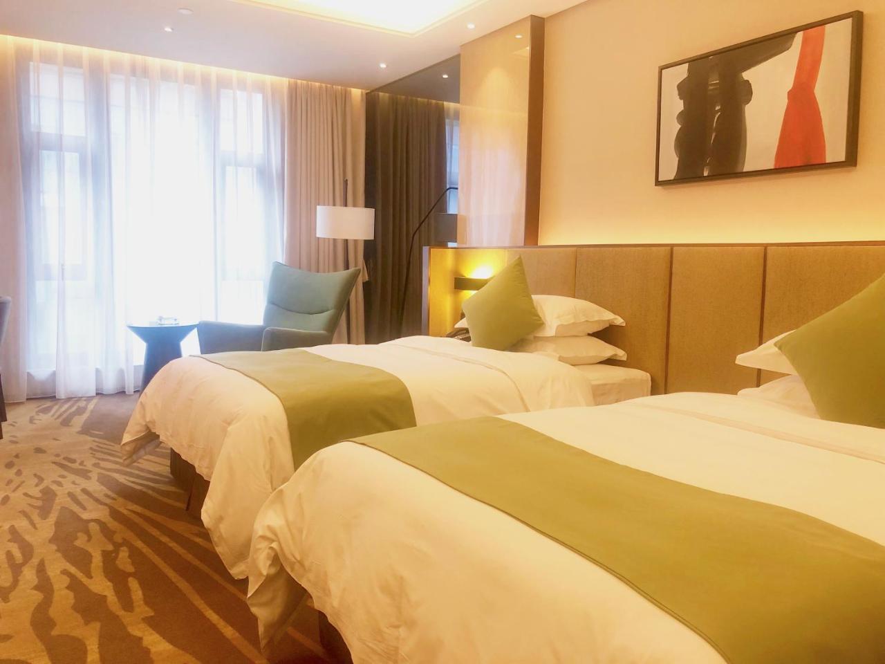 Leshan Ramada Hotel Esterno foto