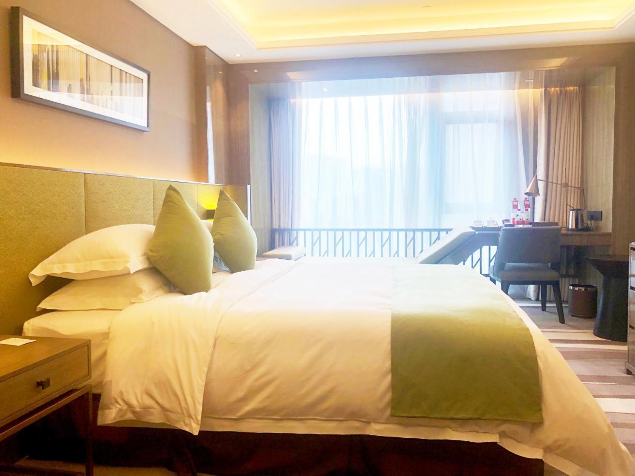 Leshan Ramada Hotel Esterno foto